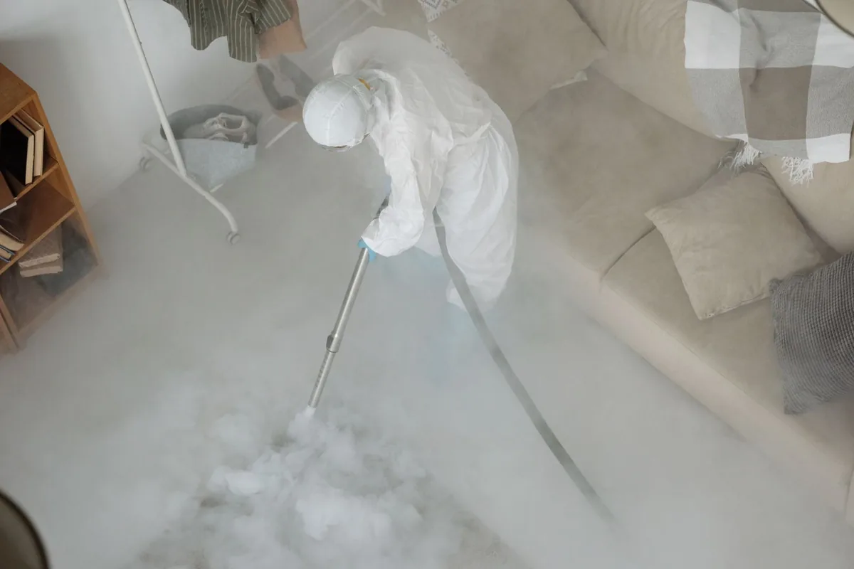 Biohazard cleanup technician in protective equipment, Monroe North, WA